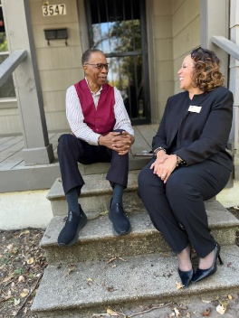 Leah Douglas Wooten talking with a senior community member